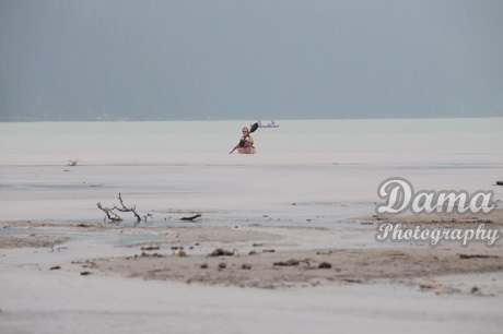 Canoeing. Rock flour carried into the lake by melt-water from the glacier, Lake Louise, Banff National Park, Alberta, Canada