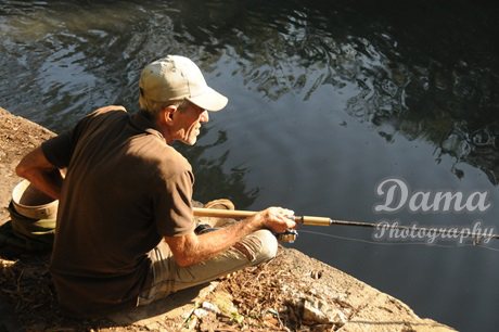 Fisherman at the highly polluted Ariguanabo river, San Antonio de los Baños, Artemisa, Cuba